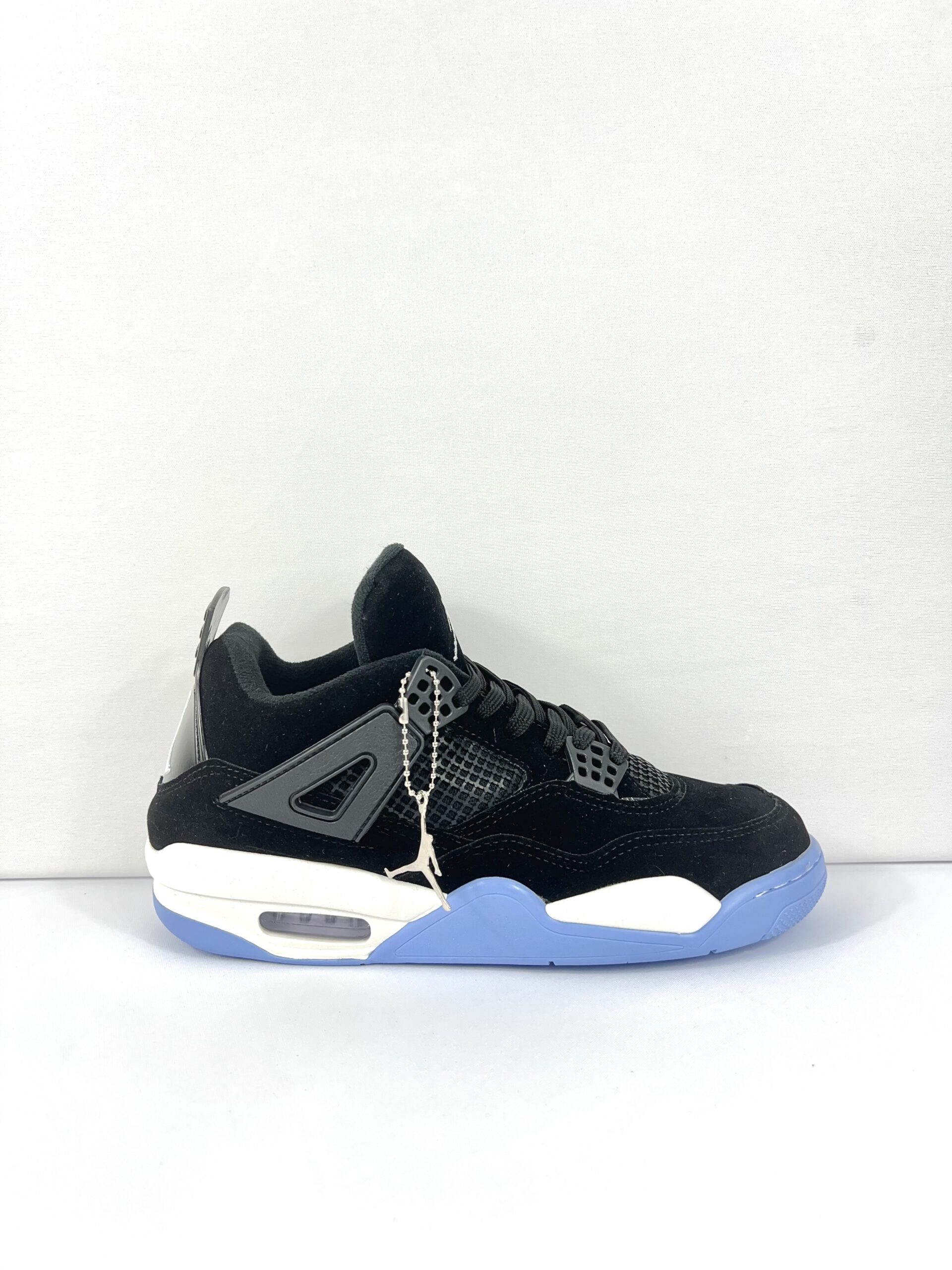 Tênis Air Jordan 4 - Preto/Branco/Azul