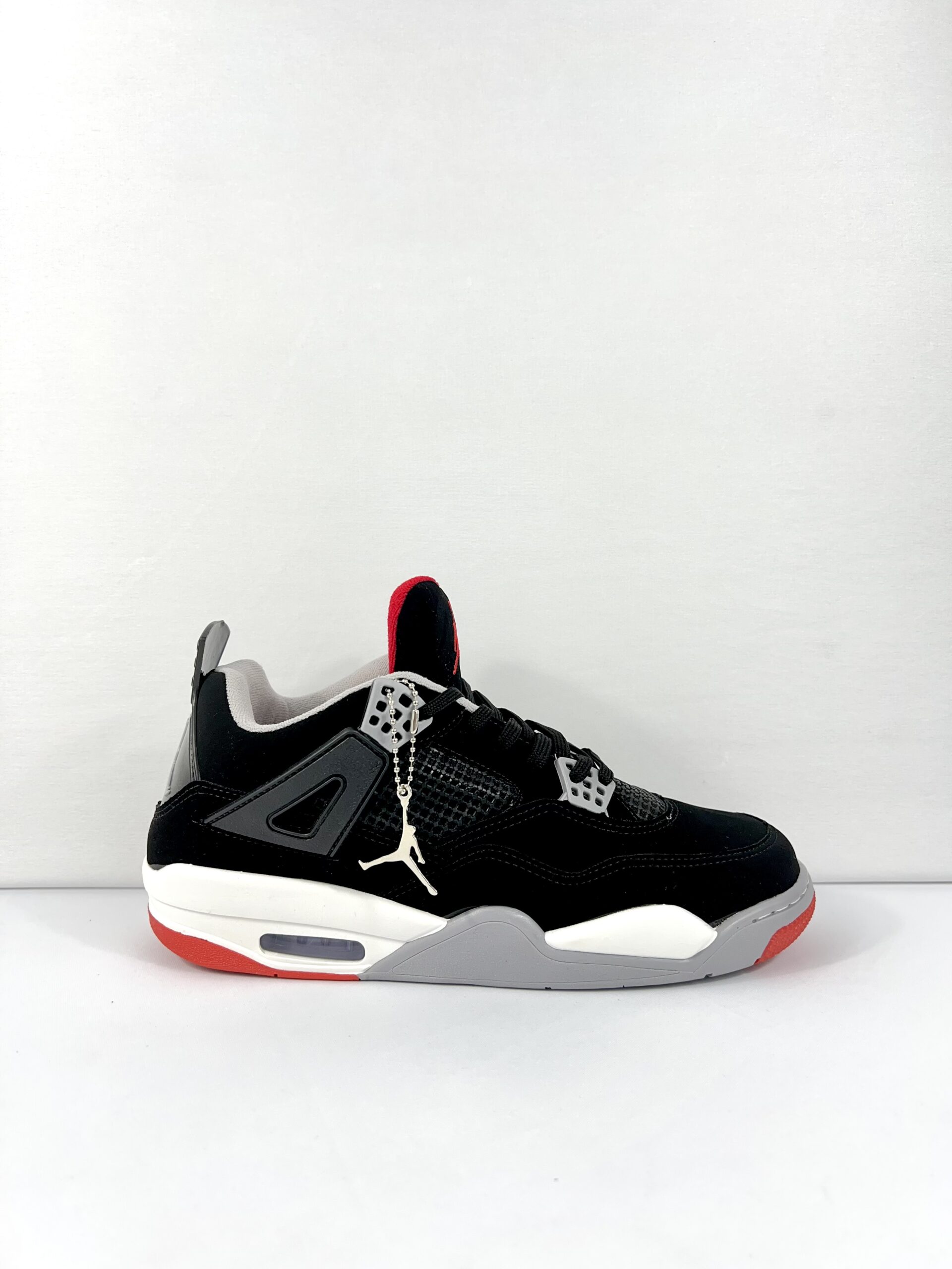 Tênis Air Jordan 4 - Preto/Branco/Vermelho